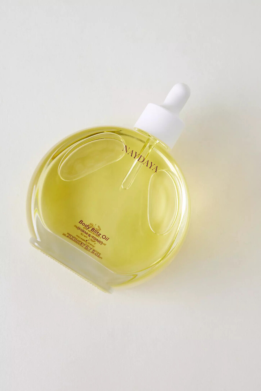 aceite reafirmante y tonificante body blitz de naydaya