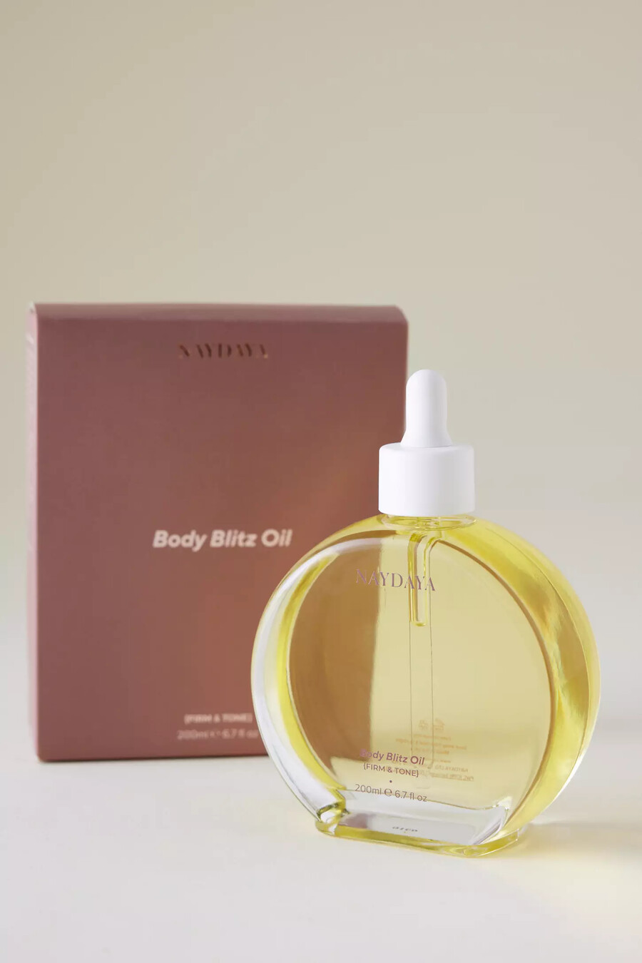 aceite reafirmante y tonificante body blitz de naydaya