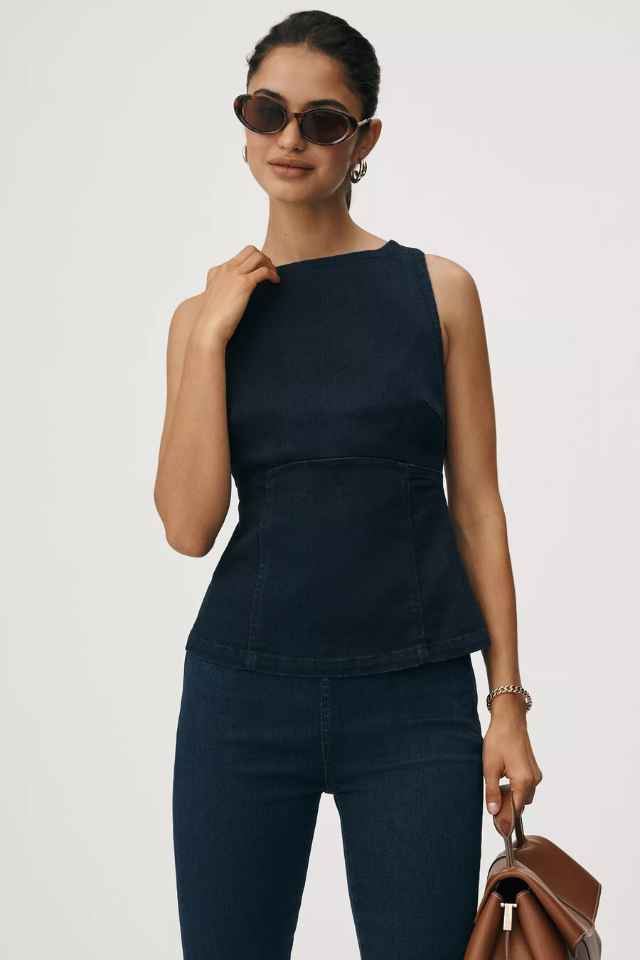 top peplum de mezclilla sin mangas con espalda abierta de pilcro