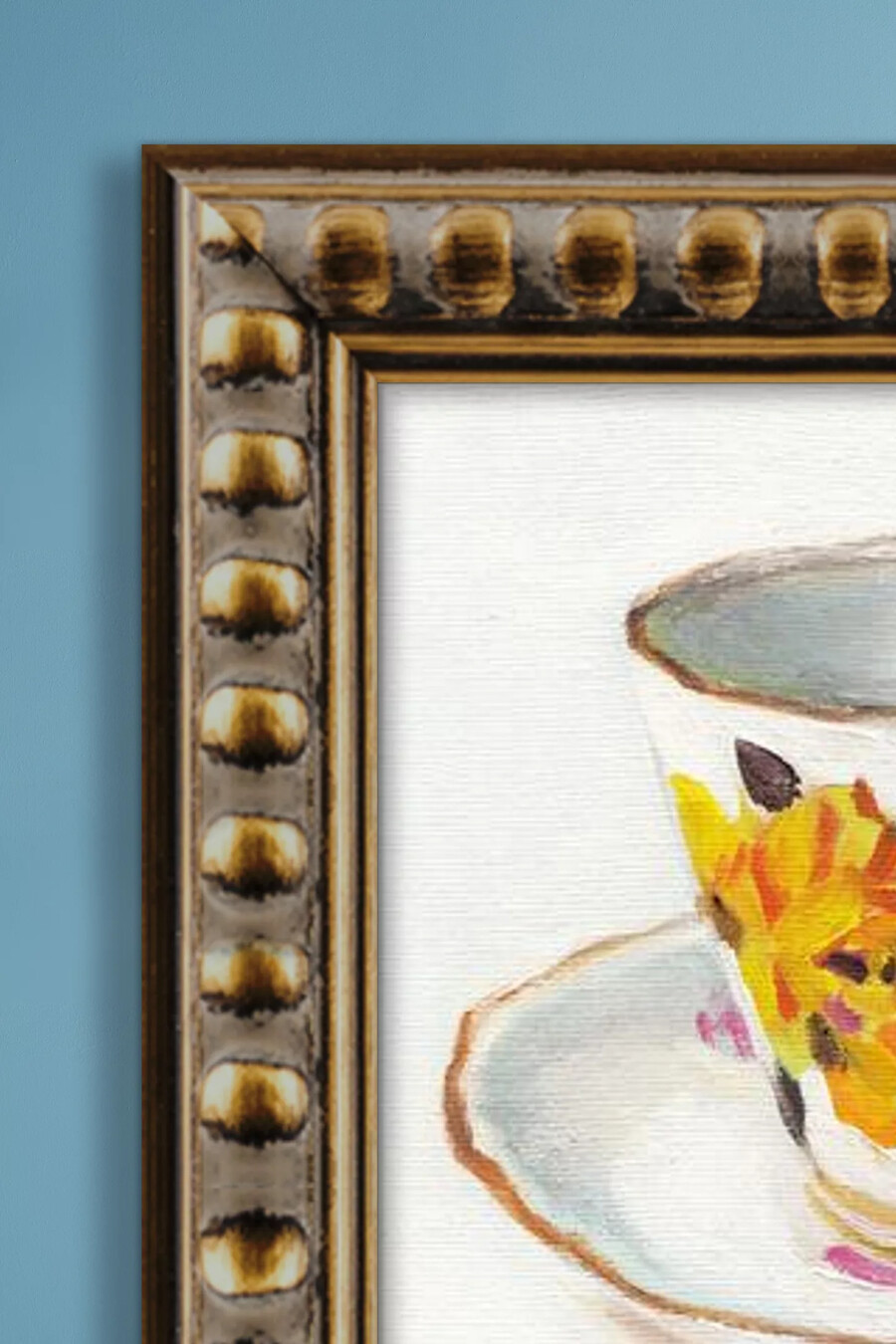 arte de pared enmarcado con taza de té y platillo