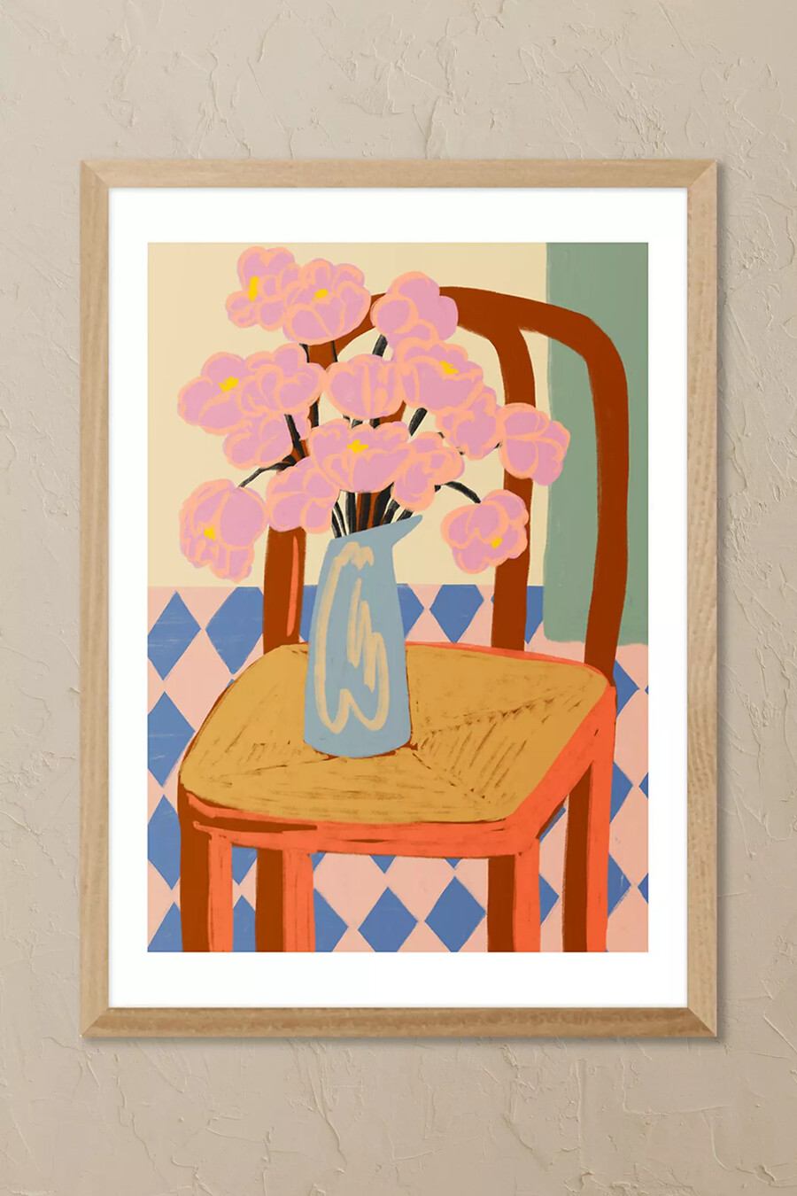 arte de pared enmarcado con flores en una silla de east end prints